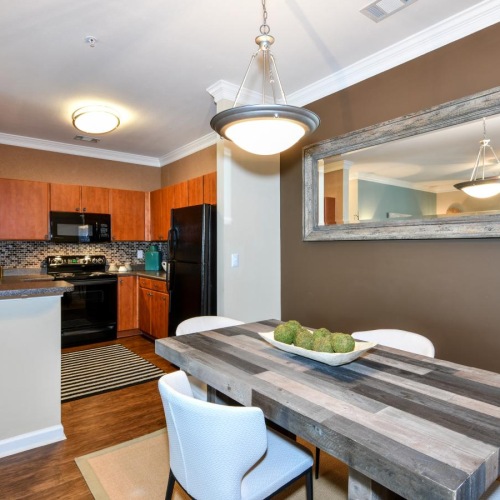 Relax and unwind in well-lit living areas a kitchen with a dining table